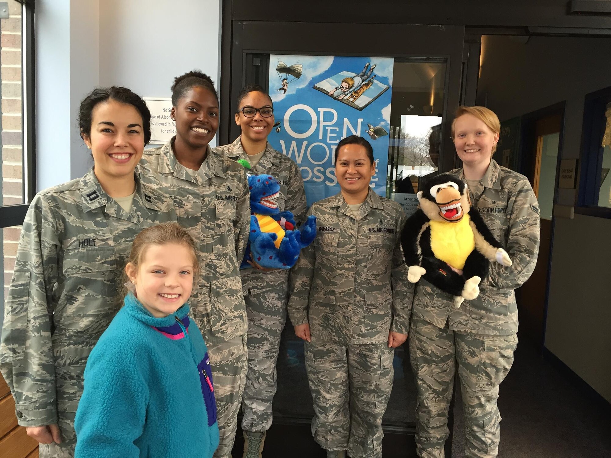 On Feb. 5, members of the Dental Squadron from the 779th Medical Group went to the Child Development Center on Joint Base Andrews to teach the kids about good dental health. From left to right are: Captain (Dr.) Melissa Holt, Air Force dentist and her daughter Samantha; Tech. Sgt. Tina Phelps-Prince, NCOIC for preventive dentistry; Senior Airman Kira Davis, dental technician; Master Sgt. Millicent Cavazos, dental hygienist; and Airman 1st Class Elizabeth Smith, dental assistant. (AF photo by Melanie Moore/Released)

