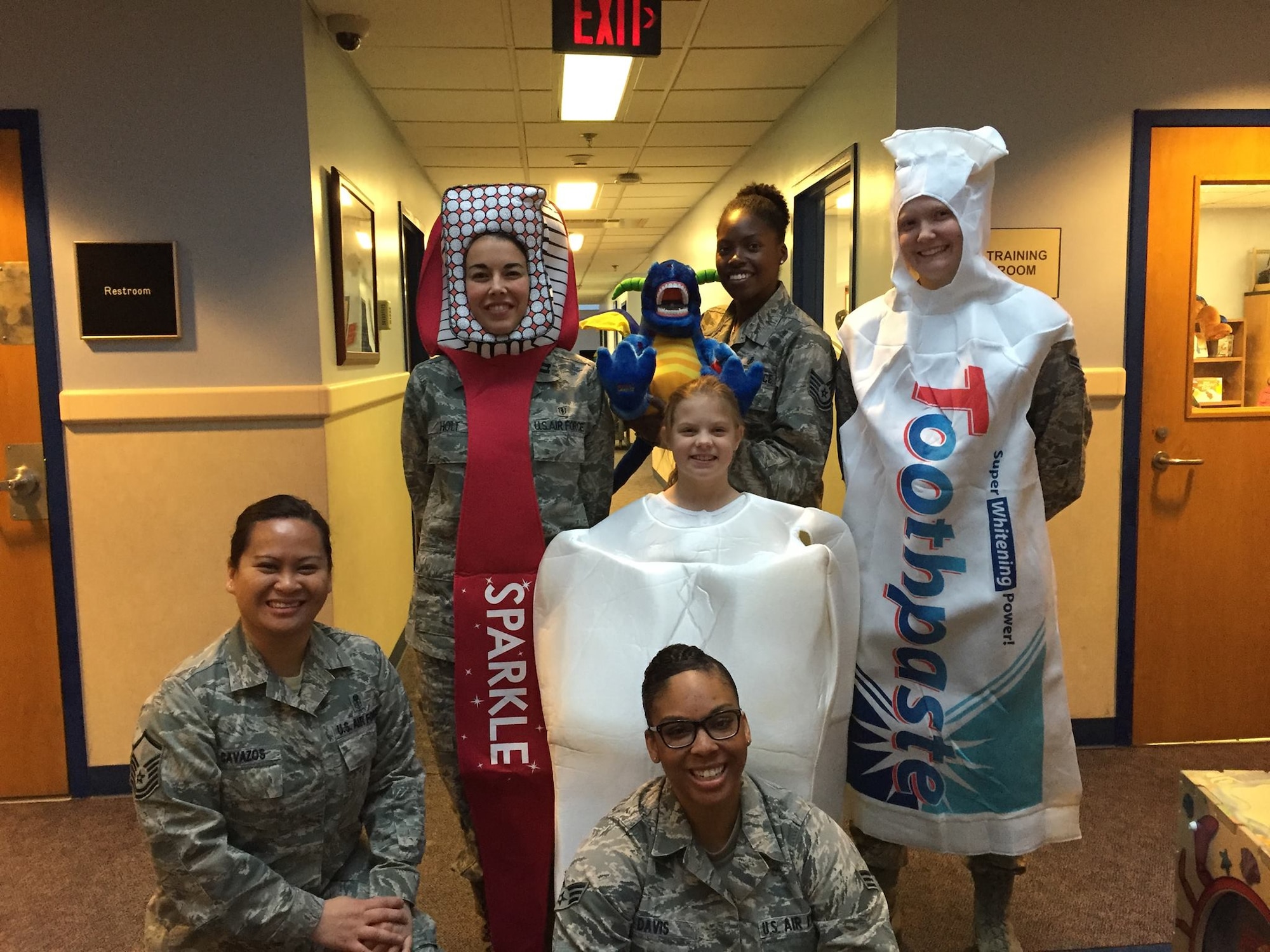 On Feb. 5, members of the Dental Squadron from the 779th Medical Group went to the Child Development Center on Joint Base Andrews to teach the kids about good dental health. From left to right are Master Sgt. Millicent Cavazos, dental hygienist; Captain (Dr.) Melissa Holt, Air Force dentist and her daughter Samantha; Tech. Sgt. Tina Phelps-Prince, NCOIC for preventive dentistry; Airman 1st Class Elizabeth Smith, a dental assistant, and Senior Airman Kira Davis, dental technician.  (AF photo by Melanie Moore/Released)

