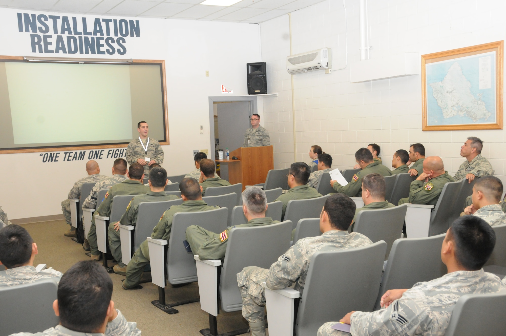 Airmen from the 203rd Air Refueling Squadron and 154th Maintenance Group receive a pre-deployment briefing at Joint Base Pearl Harbor-Hickam, Feb. 3, 2016. The airmen were completing preparations for a four month deployment to Southwest Asia as part of an Air Expeditionary Force rotation. (U.S. Air National Guard photo by Senior Airman Orlando Corpuz/released)