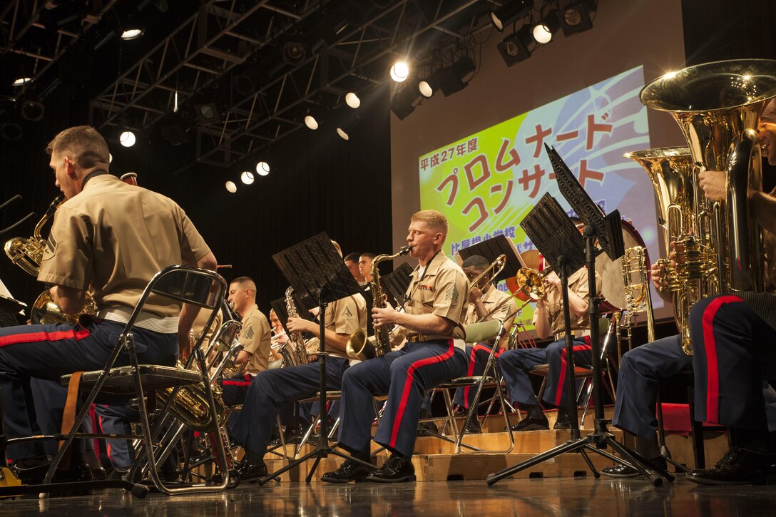 Marines with the III Marine Expeditionary Force Band performs at Koza Music Town, Okinawa City, Okinawa, Japan, for the Okinawa Promenade Concert Feb. 6, 2016. The Marines played as the finale for the concert following the Kubasaki High School Band. 