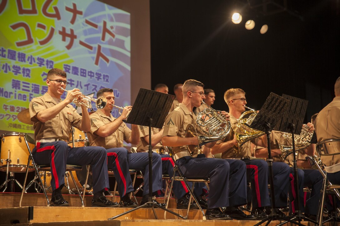 Marines with the III Marine Expeditionary Force Band perform at the Koza Music Town, Okinawa City, Okinawa, Japan, for the Okinawa City Promenade Concert Feb. 6, 2016. The III MEF Band was the final performance following the Kubasaki High School Band. 