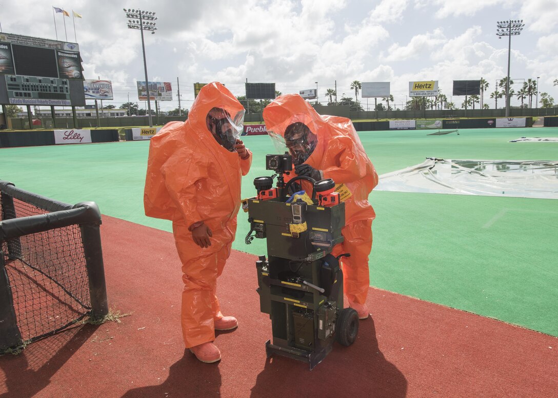 Army Staff Sgt. Mason Lord, left, and Army Sgt. Josh Lacasse prepare their cart before surveying additional areas during the unit’s proficiency training at Roberto Clemente Stadium in Carolina, Puerto Rico, Jan. 26, 2016. Lord and Lacasse are survey team chiefs assigned to the Vermont National Guard’s 15th Civil Support Team. Vermont Army National Guard photo by Staff Sgt. Nathan Rivard
