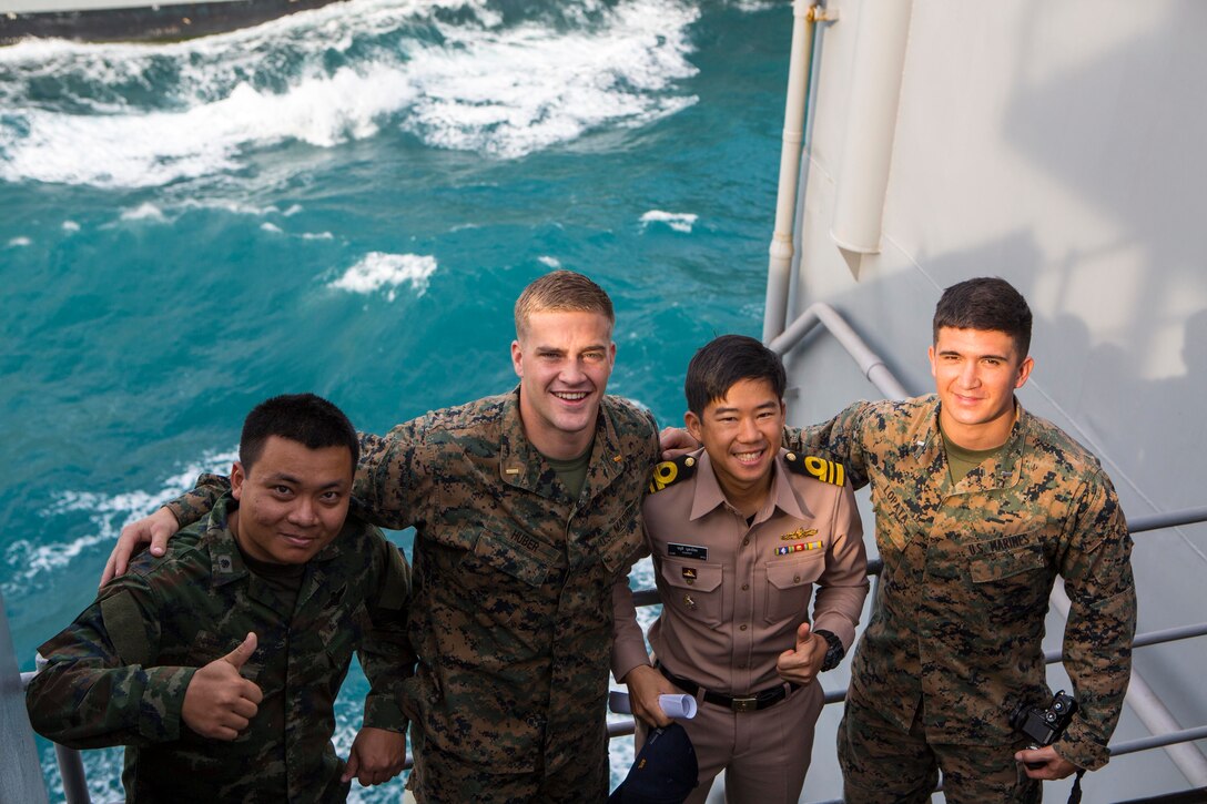 U.S. Marine Corps officers pose for a photo with members of the Royal Thai military Feb. 4, 2016. The Ashland recently went underway with the 31st Marine Expeditionary Unit as part of their spring deployment, a regularly scheduled deployment designed to support PACOM's theater security cooperation initiatives to promote goodwill, and strengthen allied relationships.