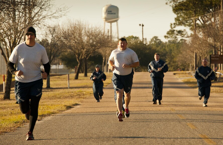 Airmen from the 919th Special Operations Wing suffered through relatively low Florida temperatures of 27 and 34 degrees respectively during their morning physical training assessments at the February unit training assembly at Duke Field.  (U.S. Air Force photo/Tech. Sgt. Sam King)