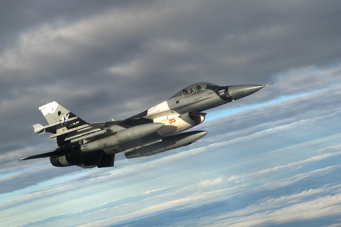 An F-16 Fighting Falcon aircraft flies in support of Forceful Tiger near Okinawa, Japan, Jan. 28, 2016. The pilot is assigned to the 18th Aggressor Squadron at Eielson Air Force Base, Alaska. Air Force photo by Staff Sgt. Maeson L. Elleman