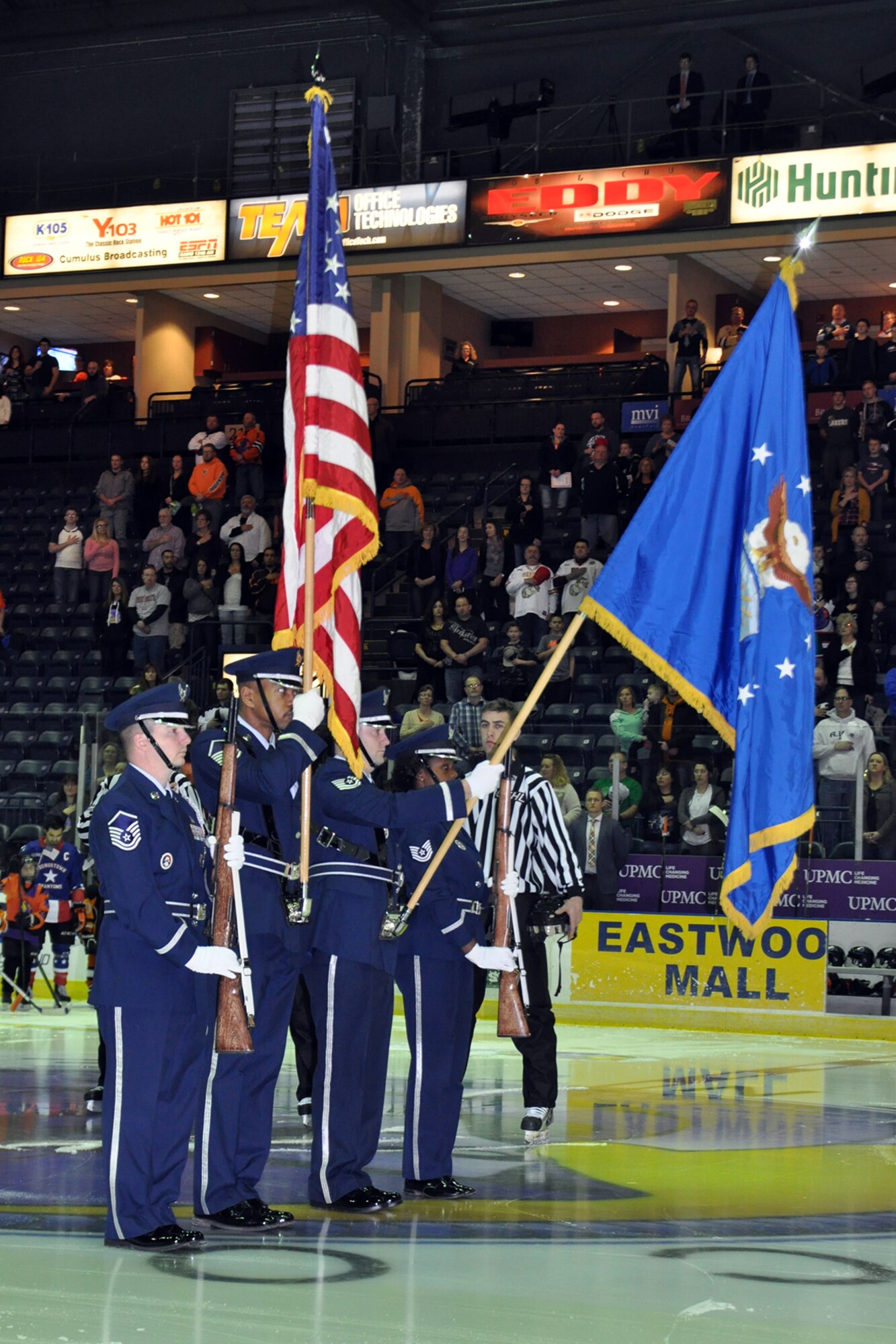 The 910th Airlift Wing Honor Guard presents the colors as part of Military Appreciation Night during a Youngstown Phantoms hockey game at the Covelli Centre here, Feb. 6, 2016. A group of more than 240 people, including Department of Defense personnel from Youngstown Air Reserve Station, Ohio and their family and friends, were among a sell-out crowd that witnessed the Phantoms defeat the Tri-City Storm 4-2 in their United States Hockey League matchup. (U.S. Air Force photo/Master Sgt. Bob Barko Jr.)