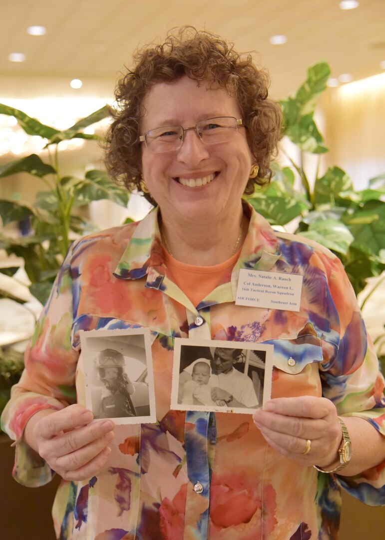 Natalie Anderson Rauch holds photos of her father, Col. Warren Anderson, a pilot who went missing during the Vietnam War, Jan. 25.  Rauch attended a government briefing hosted by the Defense Prisoner of War/Missing in Action Accounting Agency, to receive updates on her father’s case.