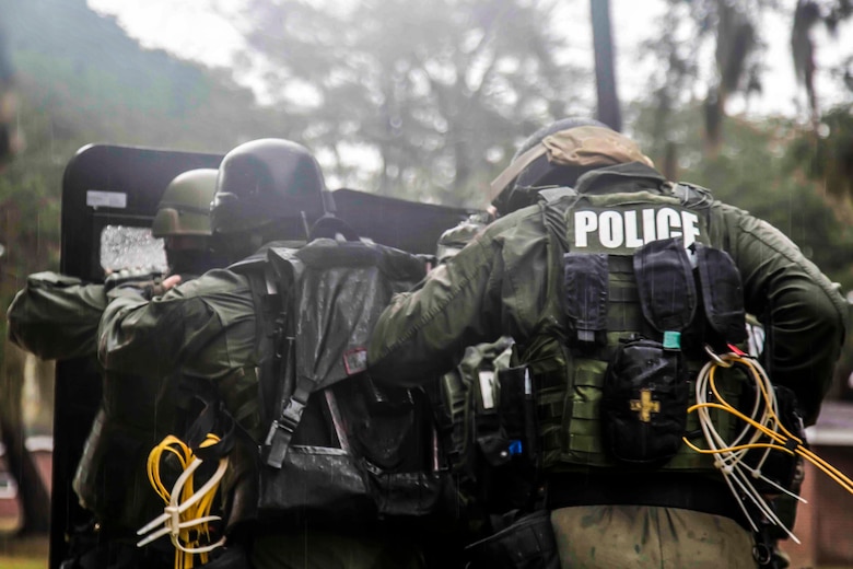 Marines conduct crisis negotiation training aboard Laurel Bay Feb. 4. Each section had a specific role to play in the field. The Special Response Team physically responded to the situation utilizing their personal protective equipment and tactics. The Marines are with the Provost Marshal’s Office aboard Marine Corps Air Station Beaufort. 