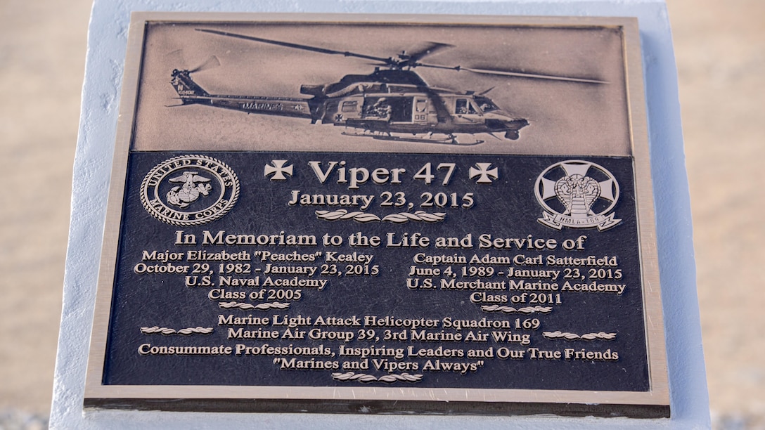 A plaque rests atop a memorial for two pilots with Marine Light Attack Helicopter Squadron 169, who passed away following a mishap last year, at the Strategic Expeditionary Landing Field, at Marine Corps Air Ground Combat Center Twenty nine Palms, Calif. Jan. 23, 2016. Marine Wing Support Squadron 374 completed the memorial in time to be unveiled on the anniversary of the incident. 