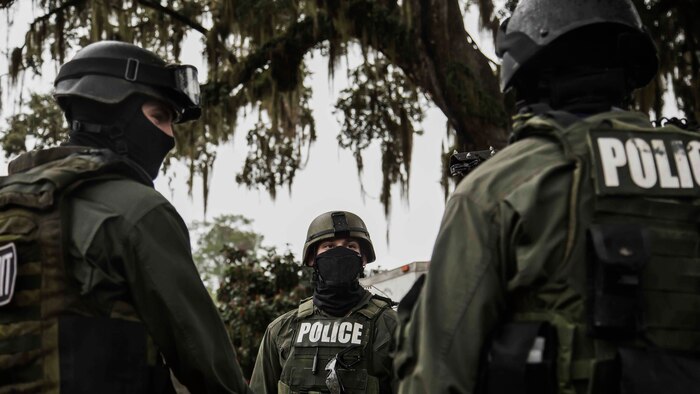 Marines brief prior to conducting a hostage scenario training aboard Laurel Bay Feb. 4, 2016. Elements from the Criminal Investigations Division and the Special Reaction Team stationed aboard Marine Corps Air Station Beaufort participated in the exercise. The Marines are with the Provost Marshal’s Office aboard MCAS Beaufort. 