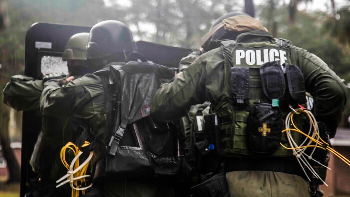 Marines conduct hostage scenario training aboard Laurel Bay Feb. 4, 2016. Each section had a specific role to play in the field. The Special Response Team physically responded to the situation utilizing their personal protective equipment and tactics. The Marines are with the Provost Marshal’s Office aboard Marine Corps Air Station Beaufort.
