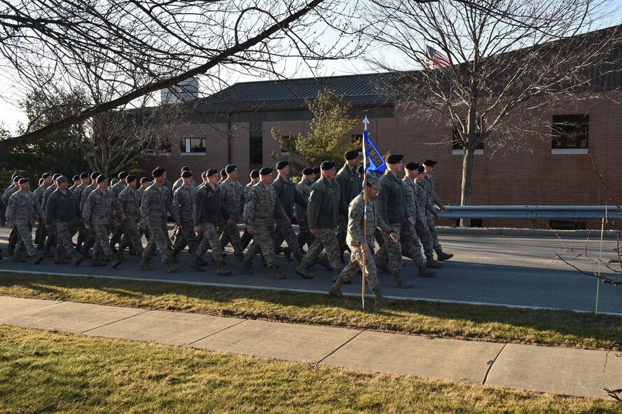 Citizen Airmen assigned to the 910th Security Forces Squadron (SFS) march back to their building after performing the retreat ceremony at installation  headquarters here Feb.6, 2016.  The retreat ceremony serves a twofold purpose. It signals the end of the official duty day and serves as a ceremony paying respect to the U.S. flag. The march is led by Master Sgt.  Joel Cummins, 910th SFS First Sergeant. (U.S. Air Force photo/ Tech. Sgt. Rick Lisum)
