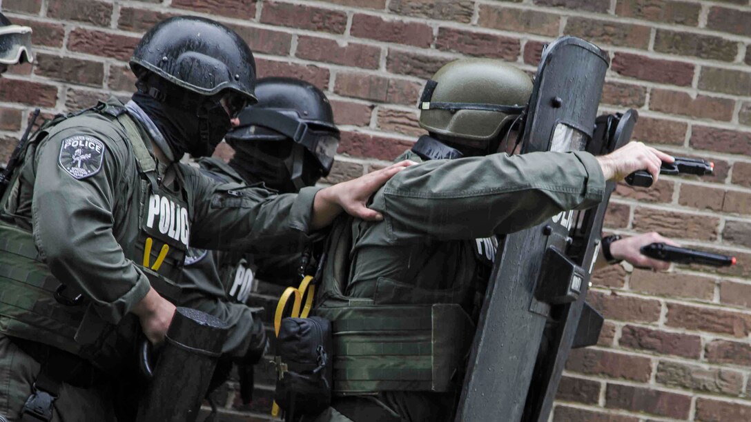 Marines conduct hostage scenario training at Laurel Bay Feb. 4, 2016. Military police from Marine Corps Air Station Beaufort and Marine Corps Recruit Depot Parris Island are the first responders for security threats aboard either installation or military housing facility. The Marines are with the Provost Marshal’s Office aboard MCAS Beaufort.