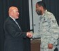 U.S. Congressman Thomas MacArthur, representing New Jersey’s 3rd District, left, congratulates Air Force Staff Sgt. Mario Manago of the 621st Contingency Response Squadron upon his graduation Jan. 28 from the Army’s Noncommissioned Officer Academy located on Joint Base McGuire-Dix-Lakehurst, N.J.