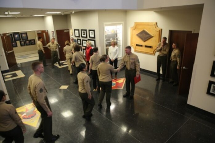 Sergeant Maj. James D. Vealey is congratulated by fellow Marines after being awarded the Meritorious Service Medal for outstanding meritorious service while serving as Sergeant Major of Combat Logistics Battalion 3, Combat Logistics Regiment 3, 3rd Marine Logistics Group, III Marine Expeditionary Force from May 2013 – July 2015 during a ceremony at Marine Corps Air Station Cherry Point, Jan 8. Vealey is the sergeant major of Marine Wing Headquarters Squadron 2. (U.S. Marine Corps Photo by Sgt. Grace L. Waladkewics/Released)