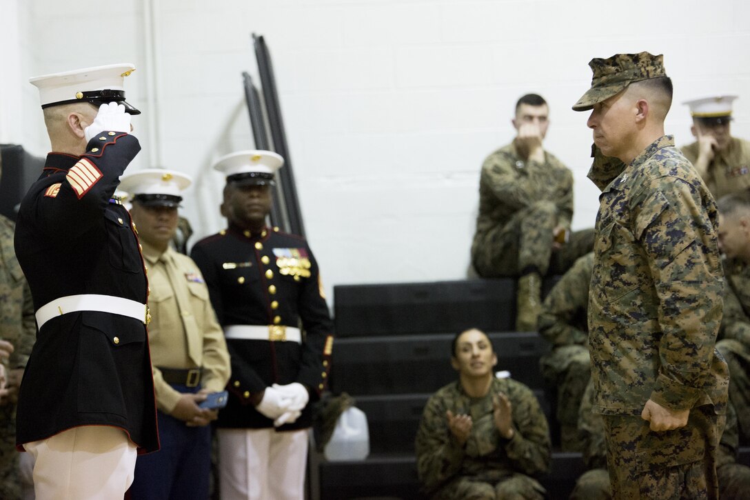 Master Sgt. Craig Harris, operations chief, Headquarters and Service Company, salutes Col. Benjamin T. Watson, commanding officer of Marine Barracks Washington, D.C. during the 2016 parade staff, Feb. 9, 2016. The evaluation selects the most qualified Marines of “the Oldest Post of the Corps” for this year’s upcoming parade season as well as assignments for ceremonies and other related events. (Official Marine Corps photo by Cpl. Chi Nguyen/Released)