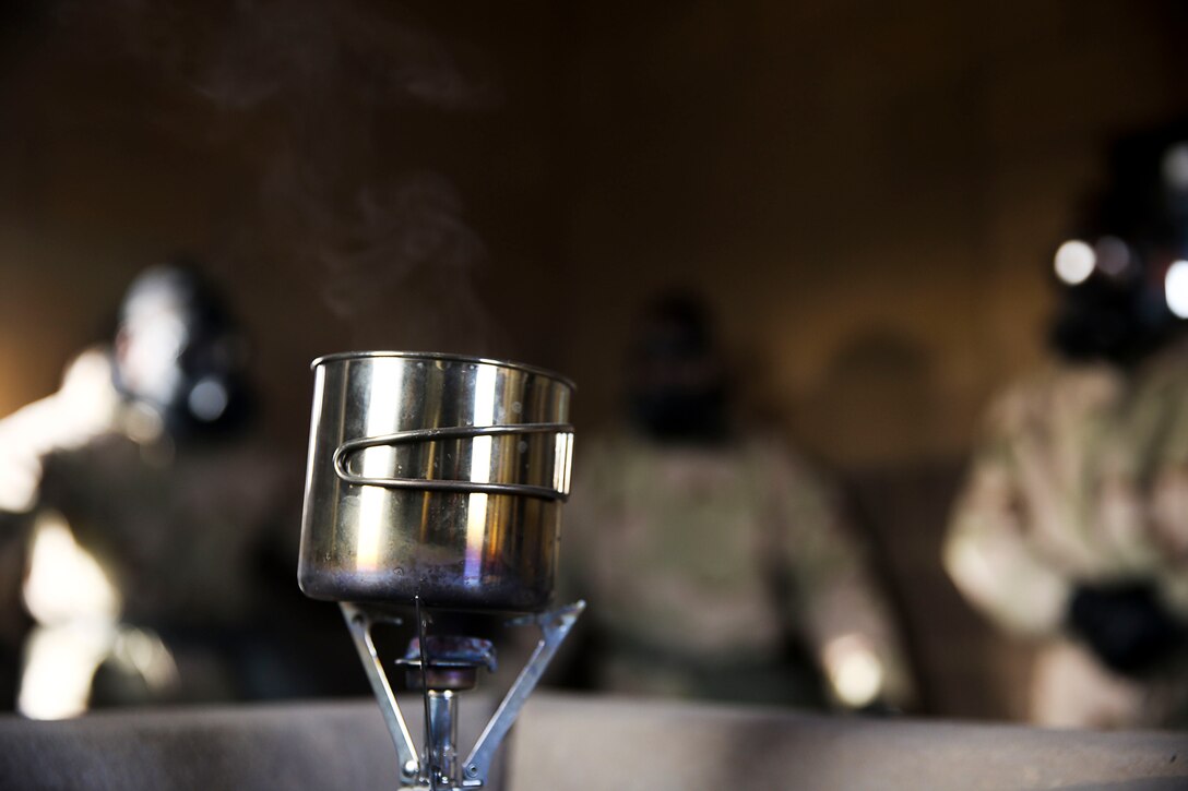 Chlorobenzalmalononitrile (CS) particles begin to burn throughout the gas chamber as Marines complete the confidence chamber during Marine Aircraft Group 13 (MAG -13) Headquarters bi-annual CBRN certification class held at MCAS Yuma, Ariz., Thursday, Jan. 28, 2016.
