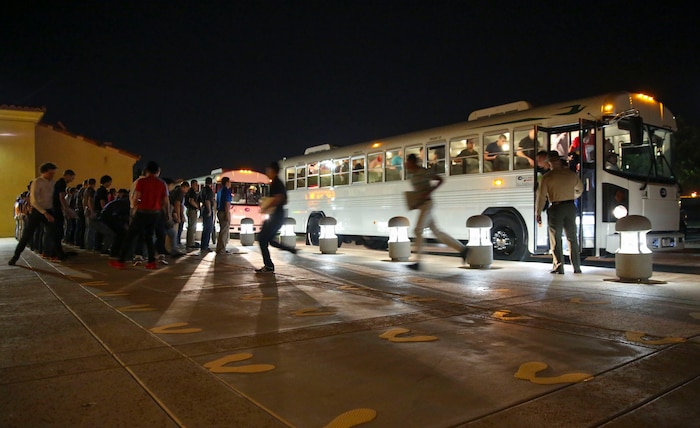 New recruits of Kilo Company, 3rd Recruit Training Battalion, are welcomed to the depot as they exit the bus and step onto the yellow footprints during receiving at Marine Corps Recruit Depot San Diego, Feb. 8. From this point on, recruits will eat, sleep and train as a team as they begin the transformation from civilian to Marine. Annually, more than 17,000 males recruited from the Western Recruiting Region are trained at MCRD San Diego. Kilo Company is scheduled to graduate May 6.