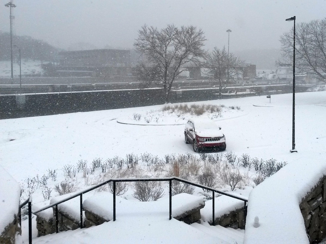 A commercial tow enters Cheatham Lock during a major snow storm at the project in Ashland City, Tenn., Jan. 22, 2016. A dozen U.S. Army Corps of Engineers Nashville District employees were recognized for their actions to keep navigation locks and hydropower plants operating when rural roads were treacherous and made it difficult for personnel to report to work. Employees worked extra shifts, slept at projects, and braved the elements in some cases to keep producing hydroelectricity and commerce moving along the waterways in the Cumberland River and Tennessee River Basins.