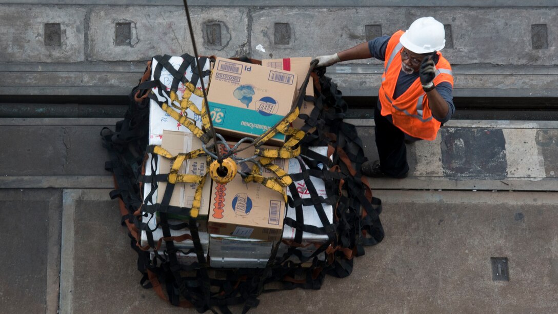 Civilian mariners unload Military Sealift Command's Marine Prepositioning Force ship USNS 1st LT Jack Lummus (T-AK 3011) at the port of Laem Chabang, Thailand, Feb. 2, in support of exercise Cobra Gold 2016. Exercise Cobra Gold 2016 is one of the largest multinational exercises in the Asia-Pacific region.