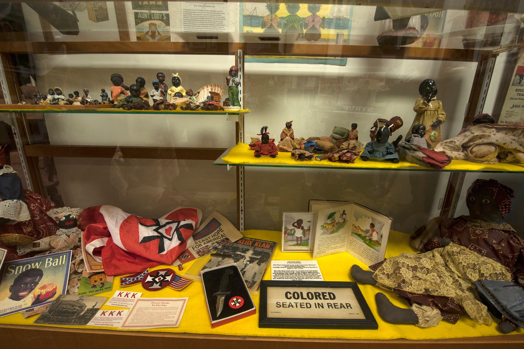 Figurines and artifacts from the Jim Crow era rest in a display case Feb. 8, 2016, at the Jack Hadley Black History Museum in Thomasville, Ga.  Jim Crow laws were enacted after slavery was abolished and were used to reinforce segregation and restrict the freedom of black people. (U.S. Air Force photo by Airman 1st Class Janiqua P. Robinson/Released)
