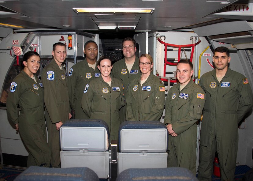 Airmen assigned to the 6th Air Refueling Squadron at Travis Air Force Base, California, pose for a group photo after completing their aerial refuel mission Feb. 7, 2016 to support aerial refuel operations for fighter aircraft conducting patrols of the airspace surrounding Super Bowl 50 in Santa Clara, California. The refueling operation was part of a NORAD mission in conjunction with NORAD’s air component Continental North American Aerospace Defense Command Region. NORAD ensures United States and Canadian air sovereignty through a network of alert fighter, tankers, airborne early warning aircraft, and ground based air defense assets cued by interagency and defense surveillance radars. (U.S. Air Force photo by T.C. Perkins Jr.)