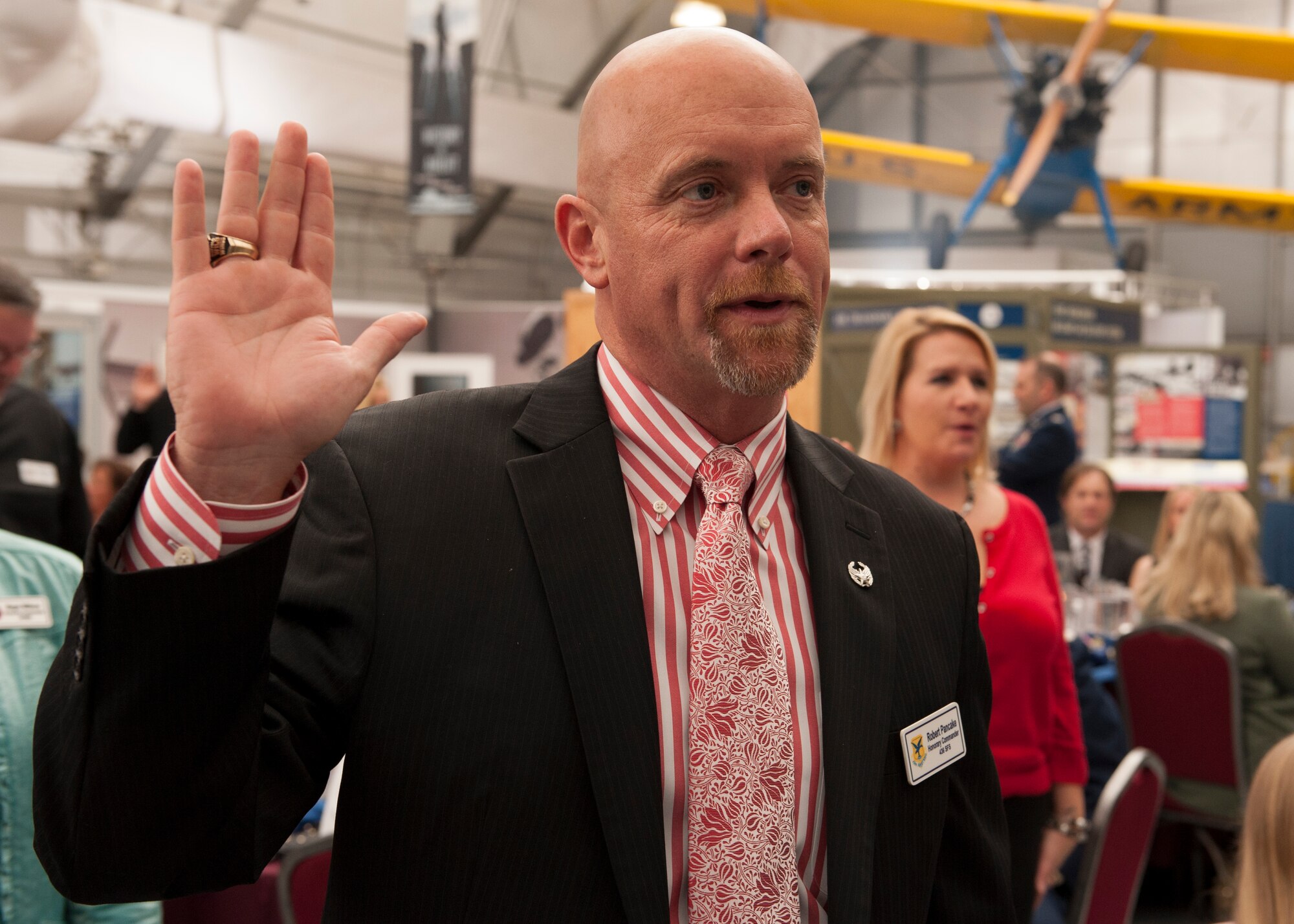 Robert Pancake, Buffalo Wild Wings franchisee, takes the Honorary Commander Oath during the 2016 Team Dover Honorary Commanders induction ceremony Feb. 6, 2016, at the Air Mobility Command Museum on Dover Air Force Base, Del. Pancake will serve as the 436th Airlift Wing’s honorary commander. (U.S. Air Force photo/Senior Airman Zachary Cacicia)