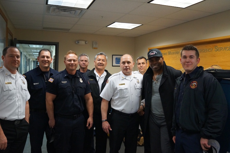 CHEYENNE MOUNTAIN AIR FORCE STATION, Colo. – Former NFL player Herschel Walker greets members of the CMAFS Fire Department during a visit to Cheyenne Mountain Air Force Station on Feb. 1, 2016. Walker was able to visit mission essential personnel despite base closures due to severe weather. His presentation about resilience was cancelled due to weather, but may be rescheduled for the spring. (courtesy photo)
