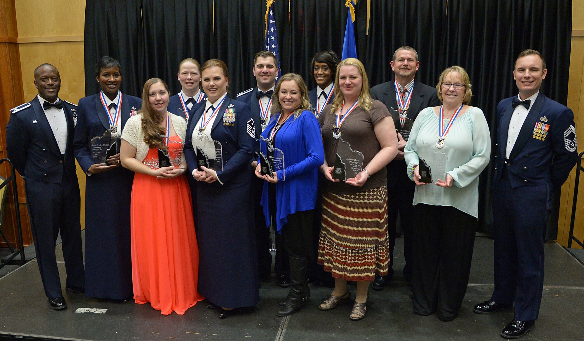 Winners and base leaders pose for a photo during the 75th Air Base Wing Annual Awards ceremony Feb. 6 at Hill Air Force Base, Utah. The event’s theme was “Legacy of Leaders.” (U.S. Air Force photo by Alex R. Lloyd)