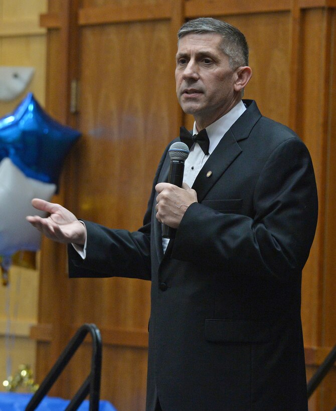 Retired Air Force Col. Randy Tymofichuk speaks during the 75th Air Base Wing Annual Awards ceremony Feb. 6 at Hill Air Force Base, Utah. Tymofichuk is currently the Director for Air Force Strategic Programs at Hill. (U.S. Air Force photo by Alex R. Lloyd)