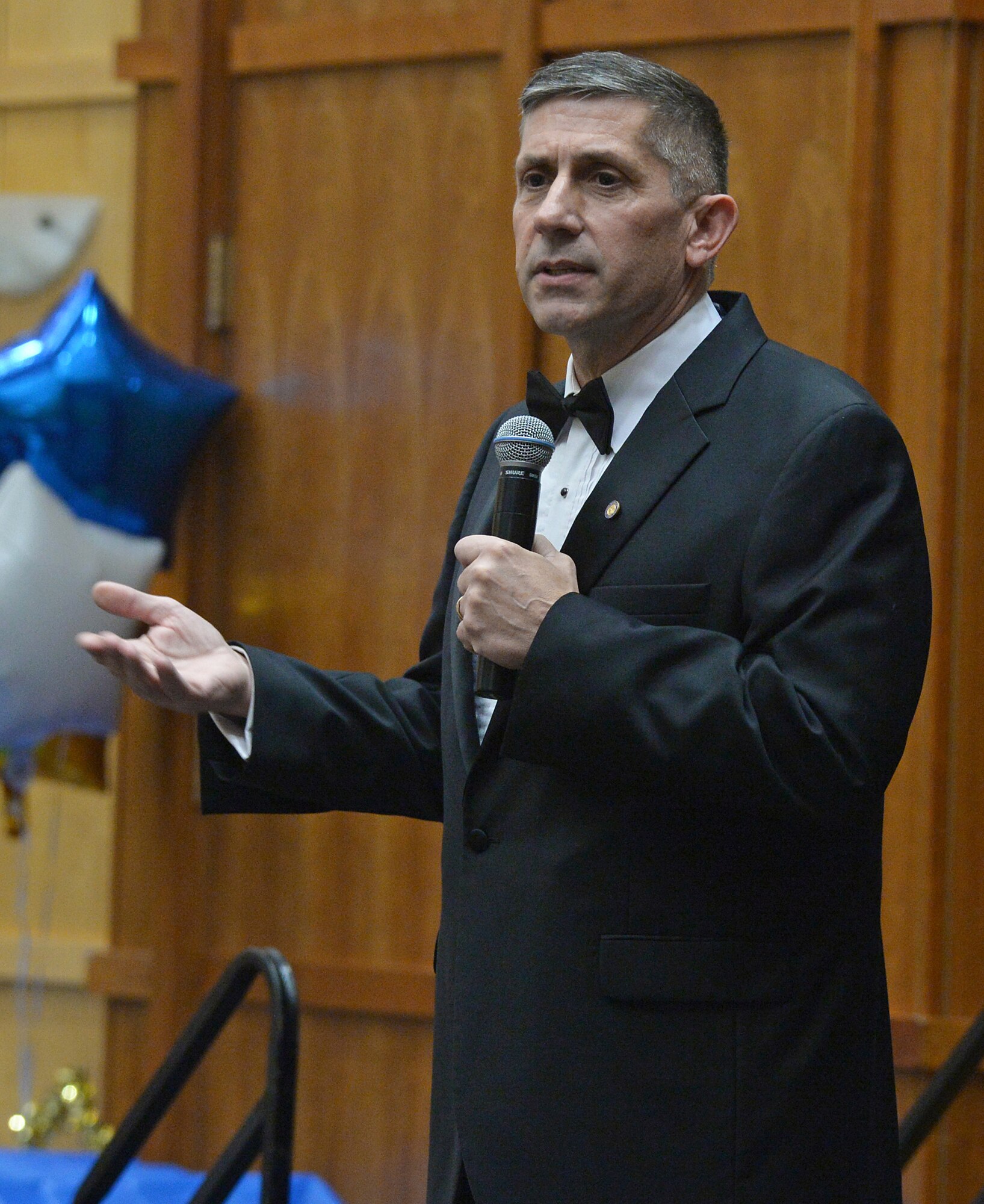 Retired Air Force Col. Randy Tymofichuk speaks during the 75th Air Base Wing Annual Awards ceremony Feb. 6 at Hill Air Force Base, Utah. Tymofichuk is currently the Director for Air Force Strategic Programs at Hill. (U.S. Air Force photo by Alex R. Lloyd)