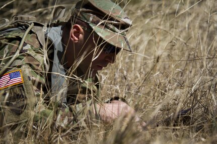 Sgt. Joseph Oneto, a military police with the 724th Military Police Detainee Operations Battalion, from Naples, Fla., orients his map before plotting points during a land navigation event at Camp Blanding, Fla., Feb. 9. The land navigation event is part of this year's 200th Military Police Command's Best Warrior Competition. The winning noncommissioned officer and junior enlisted Soldiers will move on the U.S. Army Reserve Command competition in May. (U.S. Army Photo by Sgt. Audrey Ann Hayes)