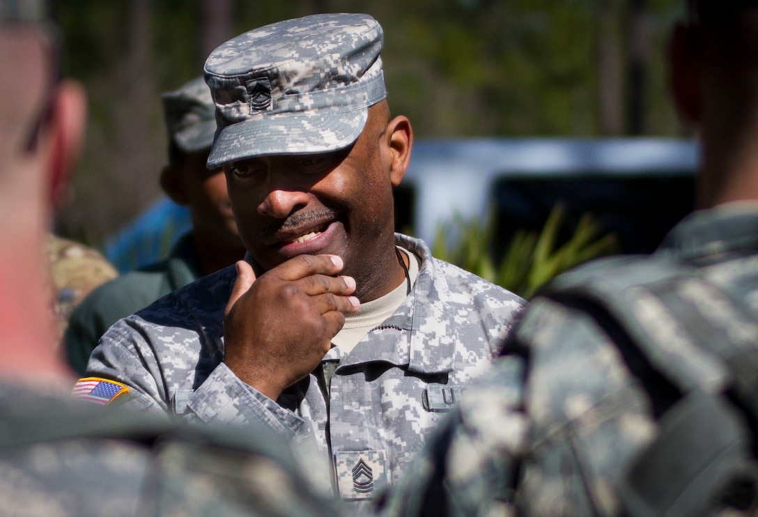 Master Sgt. Keith Dodley, the operation center's noncommissioned officer in charge for the 200th Military Police Command, from Columbus, Ohio, gives a briefing before the kick off of a land navigation event to U.S. Army Soldiers competing at this year's Best Warrior Competition at Camp Blanding, Florida, Feb. 9. The winning noncommissioned officer and junior enlisted Soldiers will move on the U.S. Army Reserve Command competition in May. (U.S. Army Photo by Sgt. Audrey Ann Hayes)