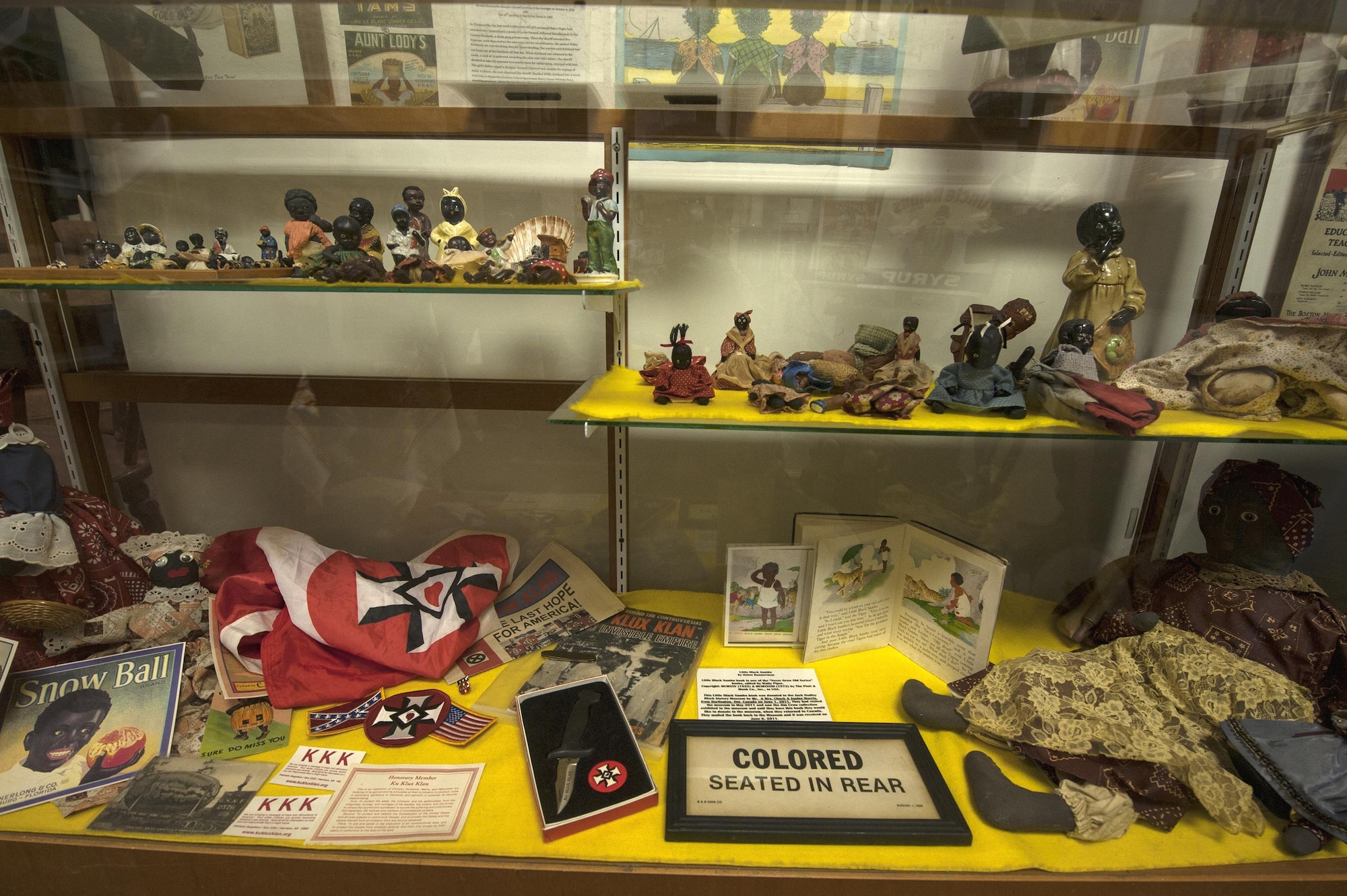 Figurines and artifacts from the Jim Crow era rest in a display case Feb. 8, 2016, at the Jack Hadley Black History Museum in Thomasville, Ga. Jim Crow laws were enacted after slavery was abolished and were used to reinforce segregation and restrict the freedom of black people. (U.S. Air Force photo/Airman 1st Class Janiqua P. Robinson)