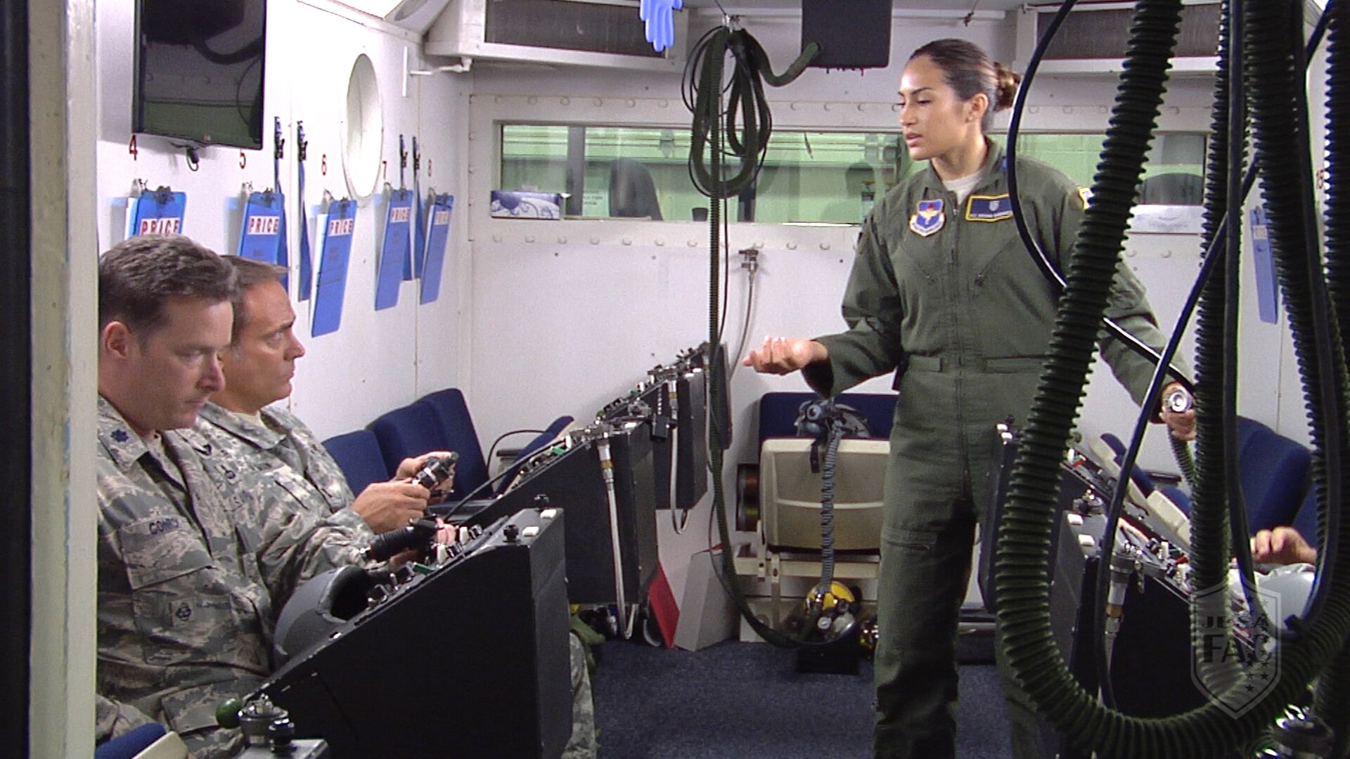 Airman 1st Class Ariana Rodriguez, 359th Aerospace-Medicine Squadron Aerospace and Operational Physiology Flight technician, explains the effects of high altitude and hypoxia during an altitude chamber training class Aug. 6, 2015, at Joint Base San Antonio-Randolph. As a member of the 359th AMS Operational Physiology Flight, Rodriguez helps manage the schedules of the flight’s 18 instructors and the 6,000 students who come for training each year.