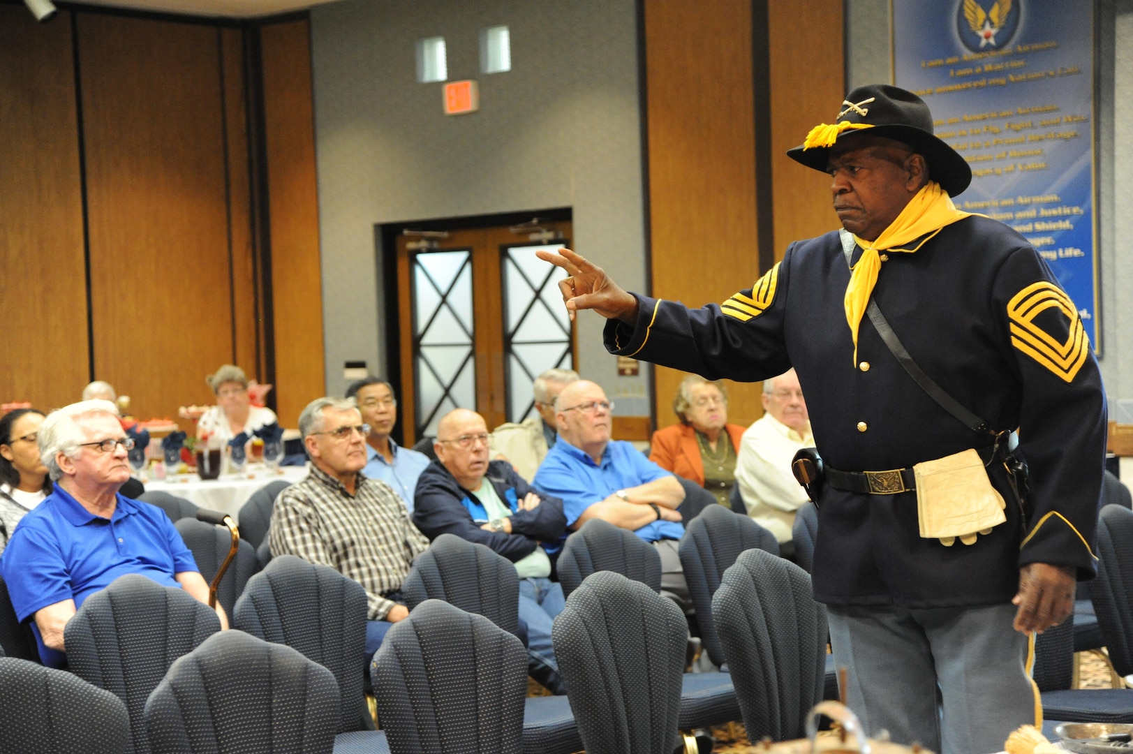Billy Gordon, member of the Bexar County Buffalo Soldiers Association, speaks to attendees in honor of Black History Month about the history of the Buffalo Soldiers Feb. 2 at Joint Base San Antonio-Randolph Kendrick Club.  It is the goal of the "Bexar County Buffalo Soldiers" to educate the public as to the great contribution made by the 9th and 10th Cavalry and the black Seminoles Indian Scouts, in bringing peace to the Western Frontier during what is known as the "Indian War Period."   (U.S. Air Force photo by Melissa Peterson/Released)