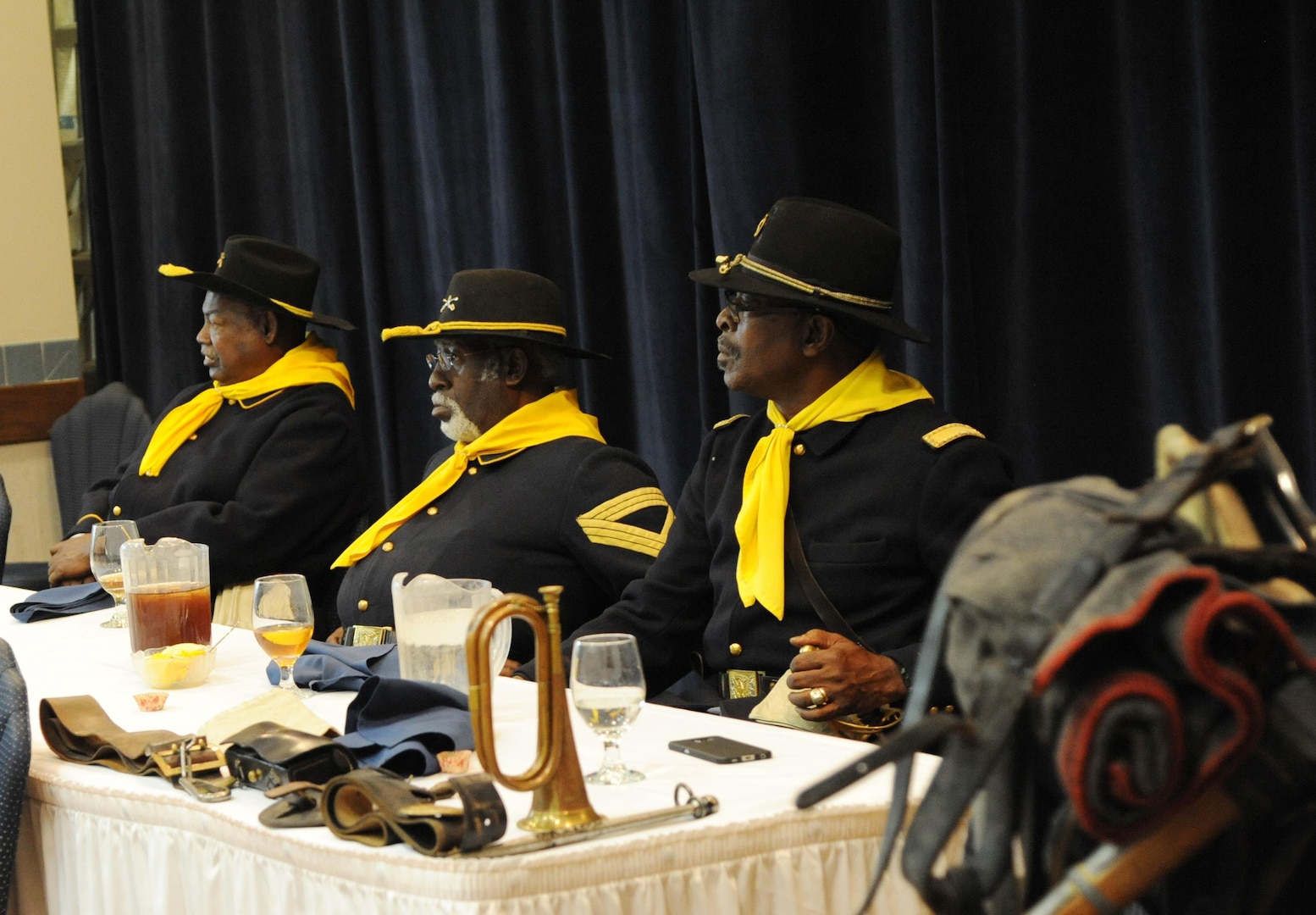 Lesley Clay, Curtis Gregory and Turner McGarity, members of the Bexar County Buffalo Soldiers Association wear the traditional uniform of a Buffalo Soldier during a presentation in honor of Black History Month about the history of the Buffalo Soldiers Feb. 2 at the Joint Base San Antonio-Randolph Kendrick Club. It is the goal of the "Bexar County Buffalo Soldiers" to educate the public as to the great contribution made by the 9th and 10th Cavalry and the black Seminoles Indian Scouts, in bringing peace to the Western Frontier during what is known as the "Indian War Period."      