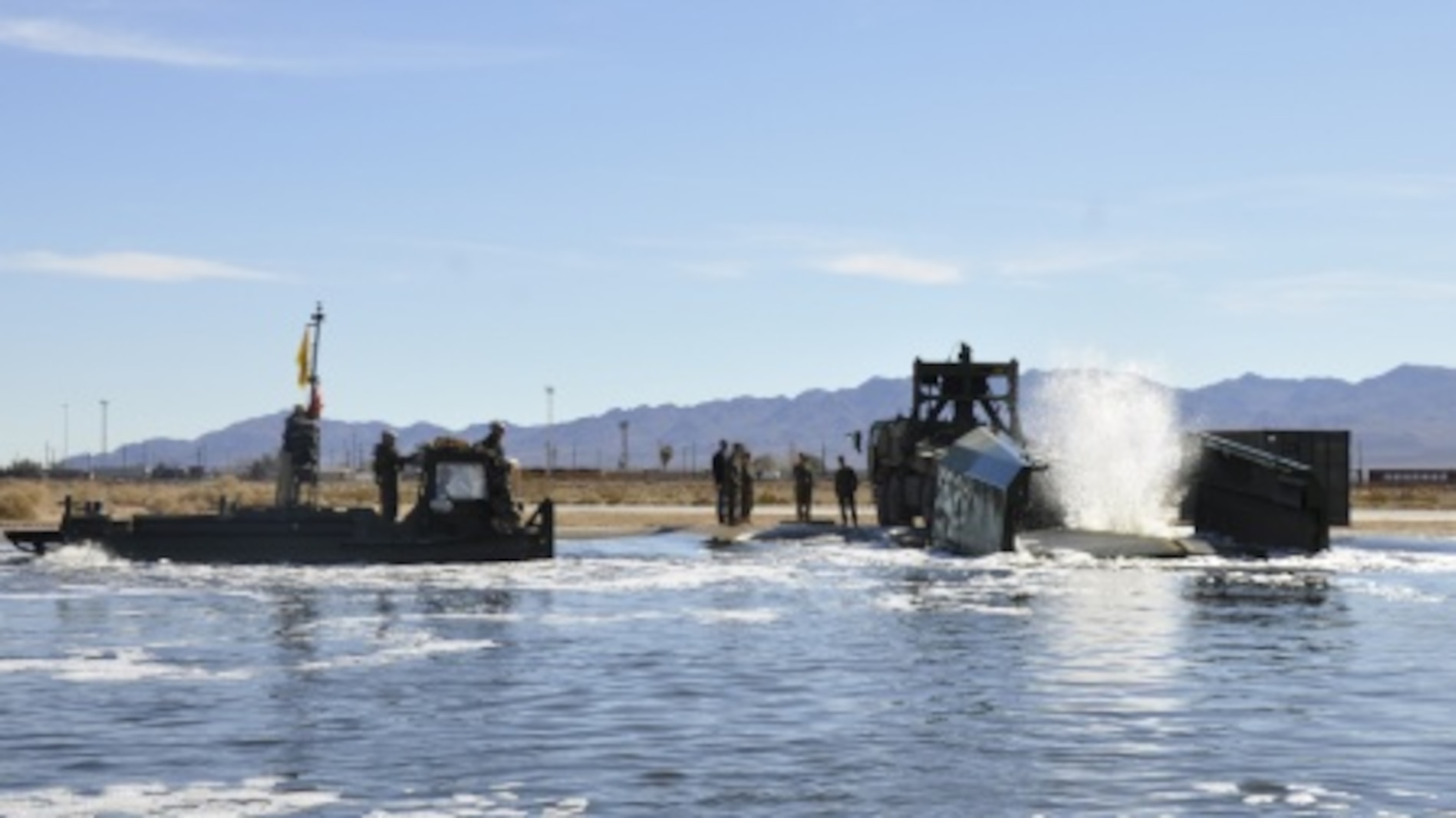 Marines with 7th Engineer Support Battalion from Marine Corps Base Camp Pendleton, Calif., test Improved Ribbon Bridge components with representatives from Marine Corps Systems Command, and Marine Corps Engineer School, at Production Plant Barstow's test pond aboard Marine Corps Logistics Base Barstow’s Yermo Annex, Calif., Jan. 25.
