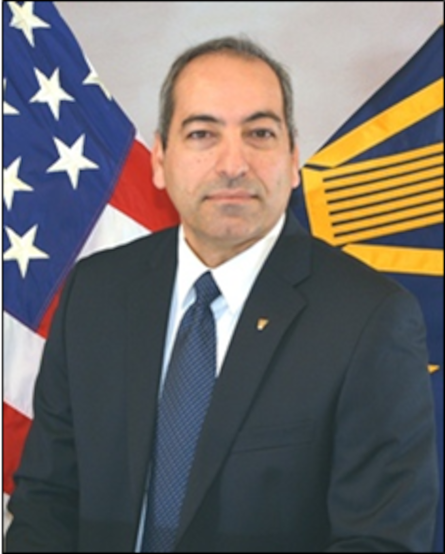 150103-N-VV028-001 - CRANE, Ind. — Dr. Adam Razavian’s career with the federal government came full circle this month when he departed from Naval Surface Warfare Center, Crane Division (NSWC Crane), which first employed him in 1989.  His last day at the warfare center was Feb. 4 and Razavian said although he was sad to leave an organization he called home for many years, he is excited to face new challenges at aerospace and defense company General Dynamics.
