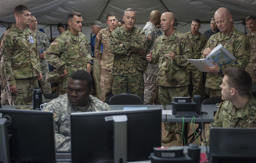 Marine Gen. Joseph F. Dunford Jr., chairman of the Joint Chiefs of Staff, tours an exercise site on Schofield Barracks, Hawaii, Feb. 9, 2016. DoD Photo by Navy Petty Officer 2nd Class Dominique A. Pineiro