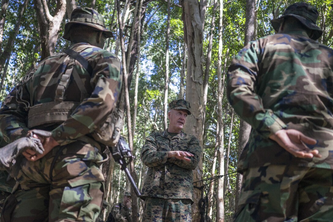 Marine Gen. Joseph F. Dunford Jr., chairman of the Joint Chiefs of Staff, speaks with instructors at the 25th Infantry Division's Tropic Lightning Academy and Jungle Operations Training Center on Schofield Barracks, Hawaii, Feb. 9, 2016. DoD Photo by Navy Petty Officer 2nd Class Dominique A. Pineiro