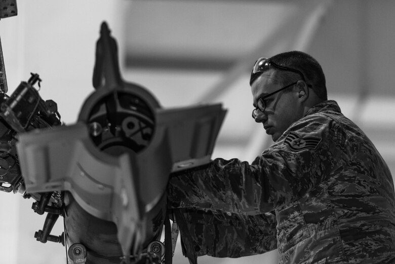 Staff Sgt. Eric Hathaway, 5th Aircraft Maintenance Squadron weapons load crew chief, loads a laser-guided GBU-12 bomb onto a B-52H Stratofortress during Exercise Combat Hammer at Minot Air Force Base, N.D., Feb. 8, 2016. According to exercise officials, the objective of Combat Hammer is to evaluate the reliability and efficiency of existing combat weapons systems while also assessing the Air Force’s air-to-ground munitions program. (U.S. Air Force photo/Airman 1st Class J.T. Armstrong)