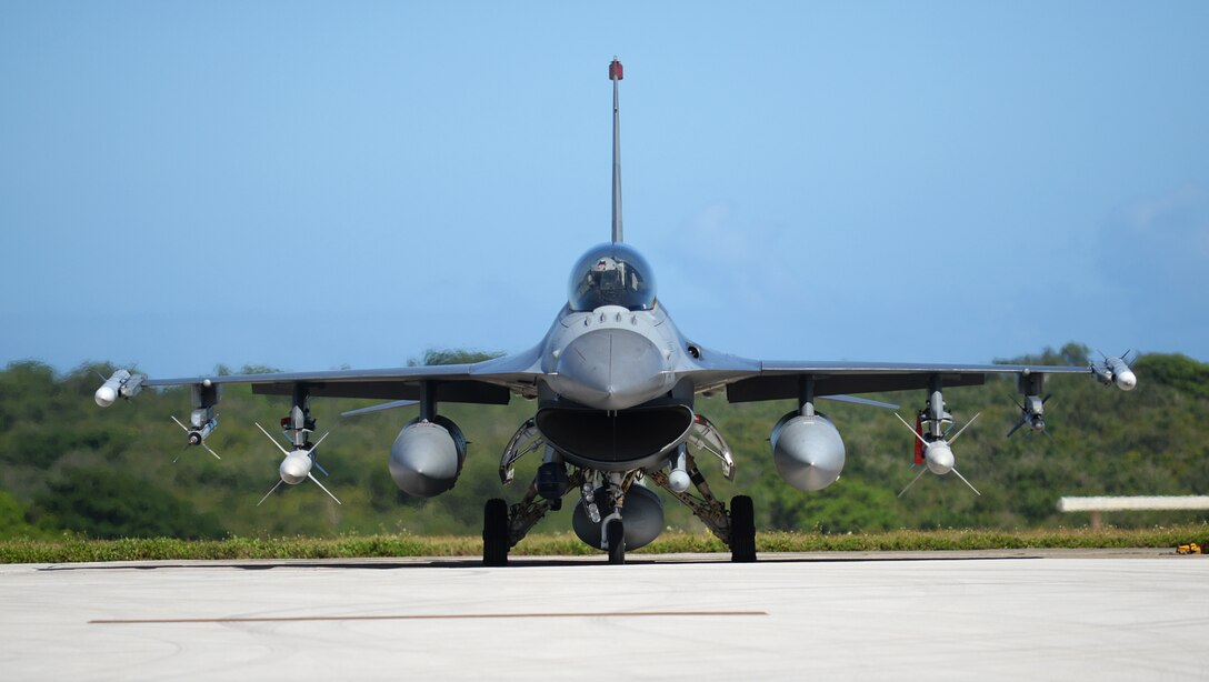 An F-16 Fighting Falcon pilot assigned to the 13th Fighter Squadron, Misawa Air Base, Japan, performs preflight checks Feb. 4, 2016, at Andersen Air Force Base, Guam.  Several F-16 Fighting Falcons from the 13th FS are deployed to Andersen AFB in support of Cope North 2016. Cope North enhances U.S. relations with regional allies and partners by demonstrating the U.S. Air Force’s resolve to promote security and stability throughout the Indo-Asia-Pacific. (U.S. Air Force photo/Senior Airman Joshua Smoot)