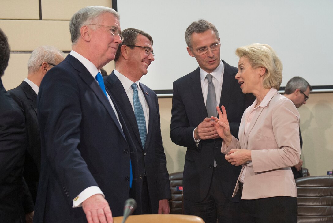 Defense Secretary Ash Carter speaks with British Defense Secretary Michael Fallon, left, NATO Secretary General Jens Stoltenberg, center right, and German Defense Minister Ursula von der Leyen as he arrives at a North Atlantic Council meeting at NATO headquarters in Brussels, Feb. 10, 2016. DoD photo by Air Force Senior Master Sgt. Adrian Cadiz
