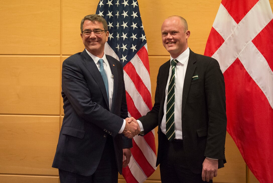 Defense Secretary Ash Carter exchanges greetings with Danish Defense Minister Peter Christensen as they prepare to discuss matters of mutual importance at NATO headquarters in Brussels, Feb. 10, 2016. DoD photo by Air Force Senior Master Sgt. Adrian Cadiz