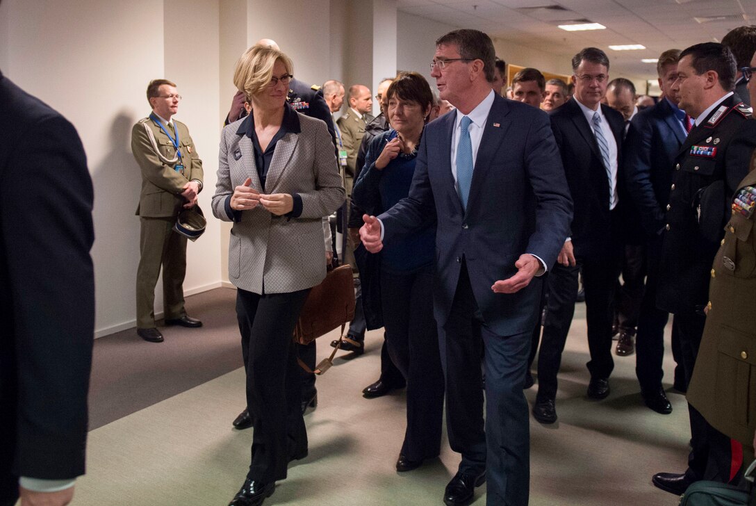 Defense Secretary Ash Carter speaks with Italian Defense Minister Roberta Pinotti between meetings at NATO headquarters in Brussels, Feb. 10, 2016. DoD photo by Air Force Senior Master Sgt. Adrian Cadiz
