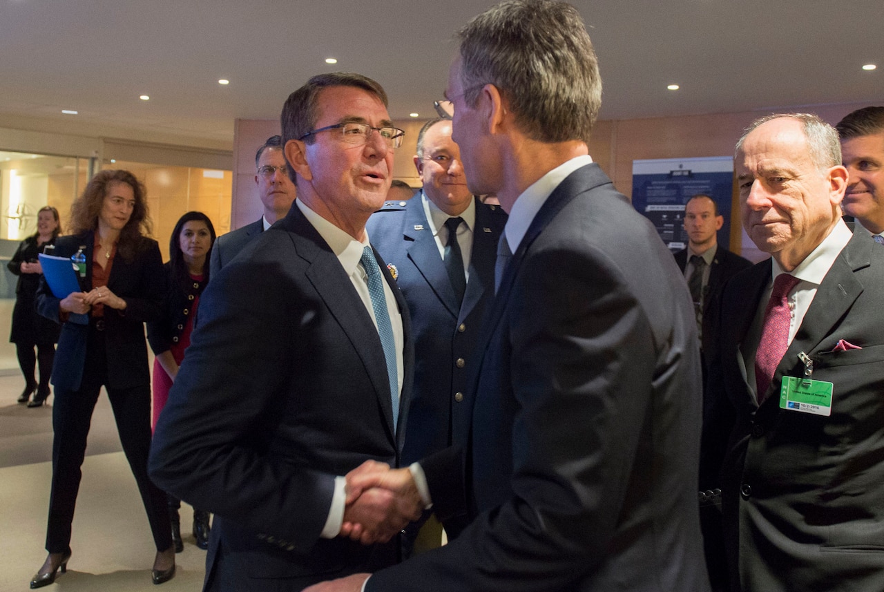 Defense Secretary Ash Carter, left, greets NATO Secretary General Jens Stoltenberg as they meet at NATO headquarters in Brussels, Feb. 10, 2016, to discuss matters of mutual importance. DoD photo by Air Force Senior Master Sgt. Adrian Cadiz