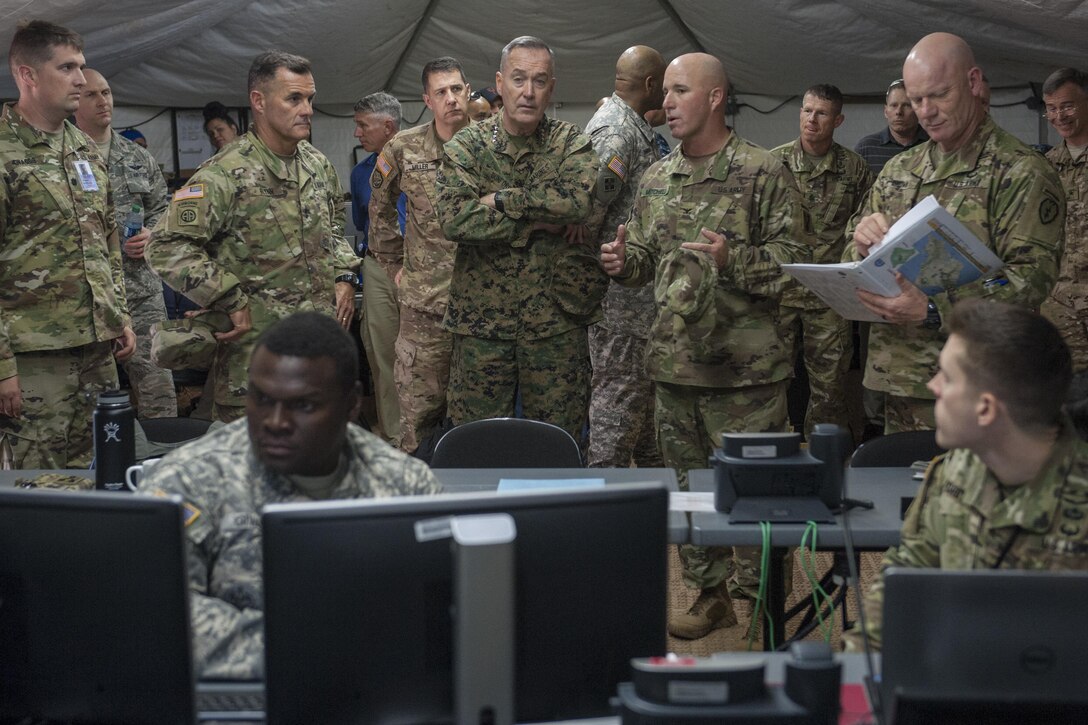 Marine Corps Gen. Joseph F. Dunford Jr., chairman of the Joint Chiefs of Staff, tours an exercise site on Schofield Barracks, Hawaii, Feb. 9, 2016. DoD Photo by Navy Petty Officer 2nd Class Dominique A. Pineiro