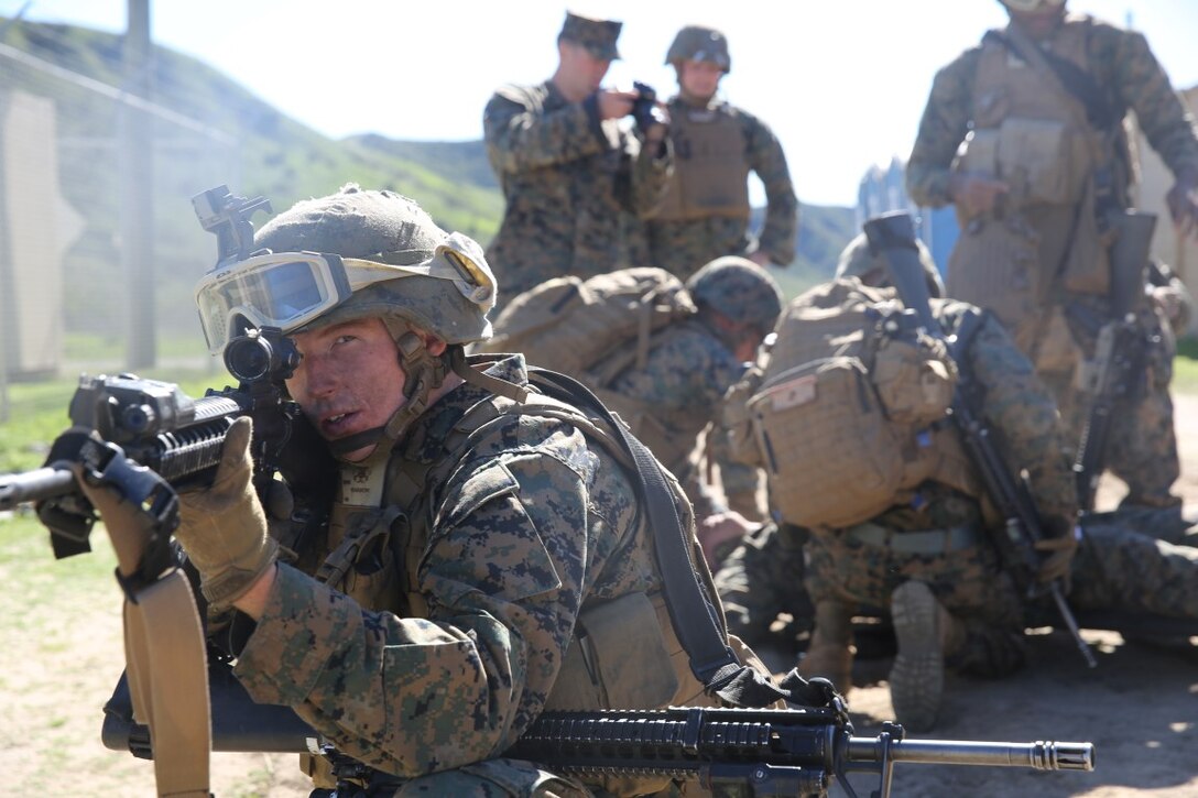 MARINE CORPS BASE CAMP PENDLETON, Calif. --Lance Cpl. Eric Mathews, a launcher crewman, provides security for a simulated casualty during a combat endurance challenge Feb. 5, 2016. The challenge consisted of hiking nearly seven miles, testing weapons systems, combat lifesaving skills, land navigation and simulated casualty evacuation. The Marines with Battery Q, 5th Battalion, 11th Marine Regiment conducted the training aboard MCB Camp Pendleton. (Marine Corps photo by Pvt. Robert Bliss)