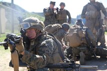 MARINE CORPS BASE CAMP PENDLETON, Calif. --Lance Cpl. Eric Mathews, a launcher crewman, provides security for a simulated casualty during a combat endurance challenge Feb. 5, 2016. The challenge consisted of hiking nearly seven miles, testing weapons systems, combat lifesaving skills, land navigation and simulated casualty evacuation. The Marines with Battery Q, 5th Battalion, 11th Marine Regiment conducted the training aboard MCB Camp Pendleton. (Marine Corps photo by Pvt. Robert Bliss)